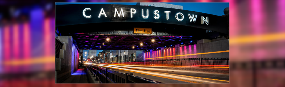 Campustown bridge banner
