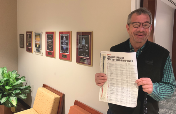 Peter Birnbaum holding issue of Crain's